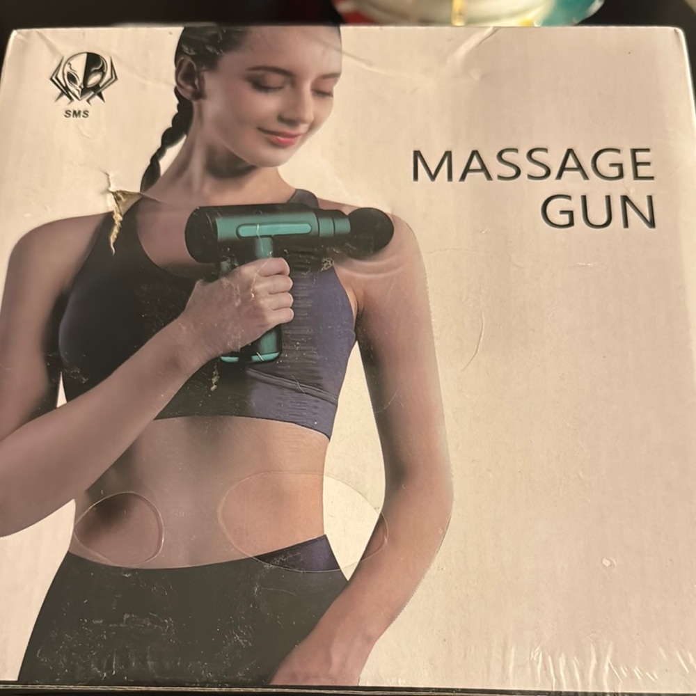 Massage Gun with Black and Teal Design